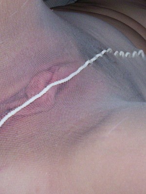 Couple fucks right through sheer nylon